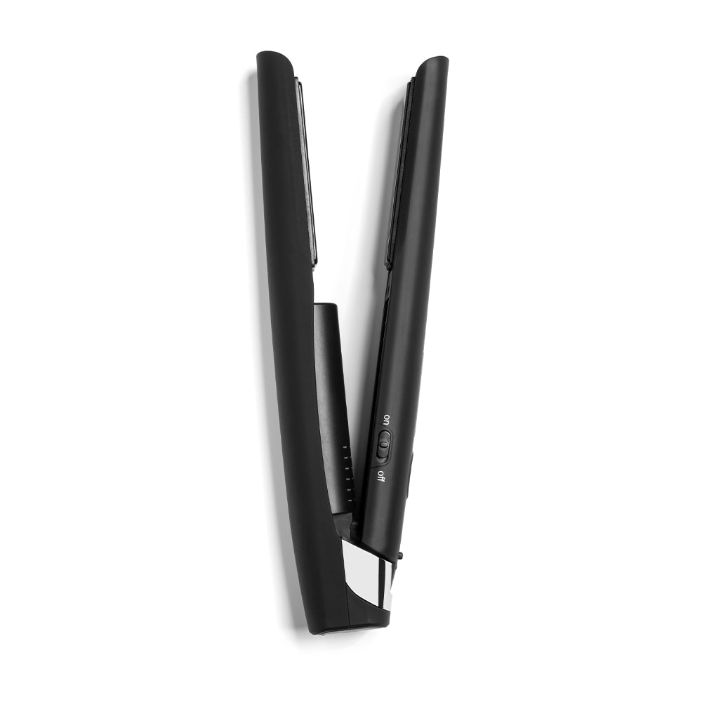 Sam Villa Pro Results Cordless Flat Iron with tourmaline-coated plates and nano-silver technology, featuring 45 minutes of cordless styling, USB-C charging, and a heat-resistant travel pouch for professional, on-the-go hair straightening or curling.