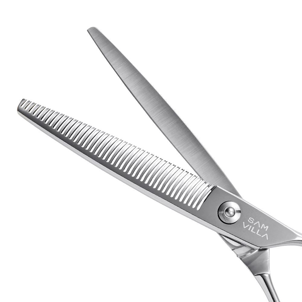 Sam Villa Signature Series Reversible Blending Shear with 42 curved V-tip teeth for fast, seamless blending and texturizing, ergonomic crane handle, and Japanese molybdenum alloy steel construction, ideal for wet or dry cutting by professional stylists