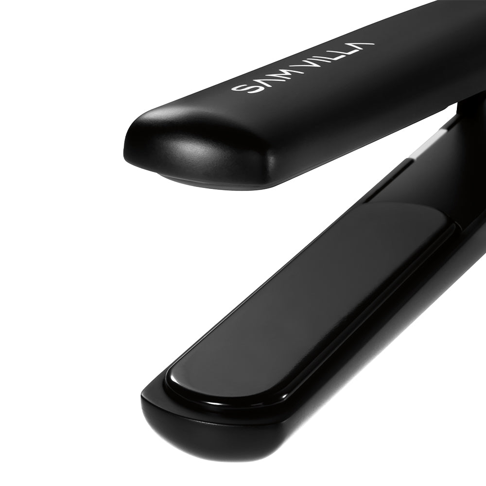 Professional ceramic straightening iron with adjustable heat settings for smooth, shiny hair. Salon-grade flat iron with floating plates, ergonomic handle, and snag-free styling