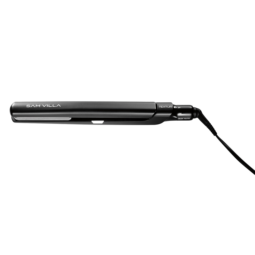 Lightweight ergonomic handle on Sam Villa Texture Iron for professional styling comfort.