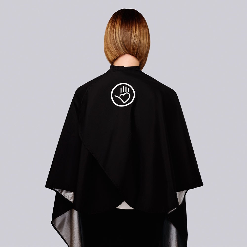 Sam Villa Reversible All-Purpose Cape, professional salon cape with black and silver sides for contrast on light or dark hair, waterproof and chemical resistant, lightweight high-tech material, extra-large size with adjustable snap neck closure for comfortable secure fit, essential for hair cutting, coloring, and styling