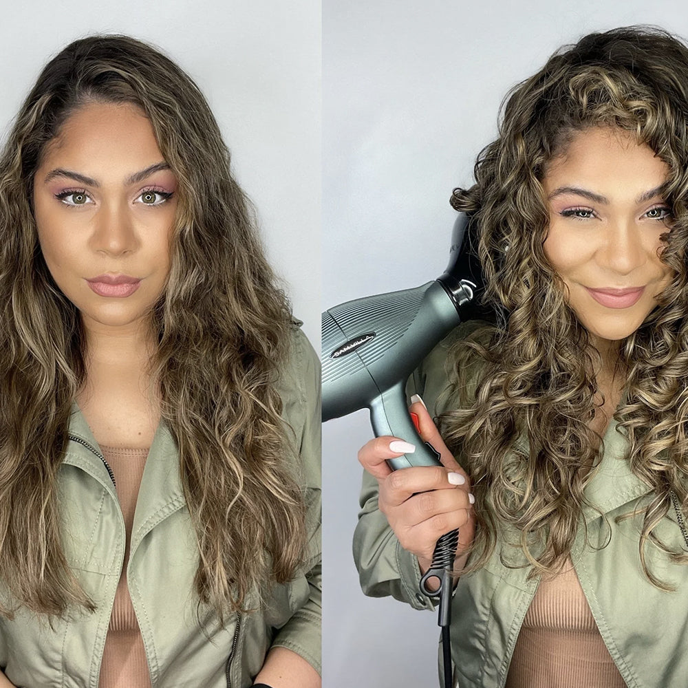 Side-by-side images of a model with long wavy hair. On the left, the model is shown with natural waves and a neutral expression. On the right, she is smiling while holding a Sam Villa hairdryer, demonstrating a styling process.
