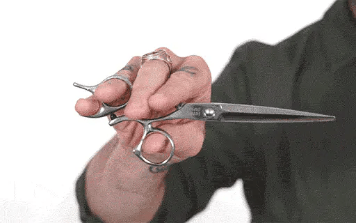 Sam Villa Essential Series Shear with ergonomic forward-set handle, convex blades, and Japanese stainless steel for smooth, comfortable wet or dry hair cutting.